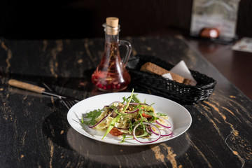 Siberian salad with herbs and pine nuts