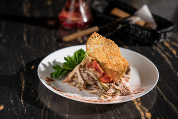 caesar salad with lettuce chicken breast tomato cucumber cheese and sauce