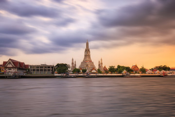 Wat Arun Ratchawararam Ratchawaramahawihan at sunset in bangkok Thailand. Landmark of Thailand