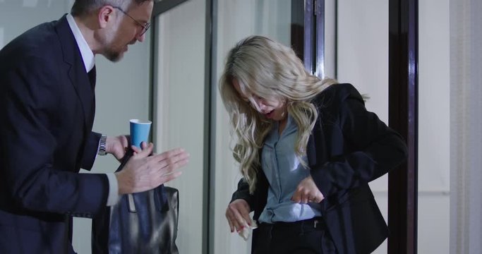 Businesswoman soaking up decanted shirt