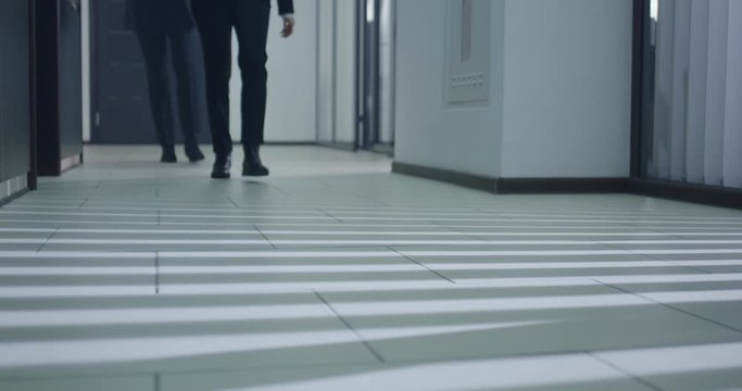 Business people walking in corridor