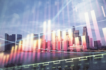 Forex chart on cityscape with tall buildings background multi exposure. Financial research concept.