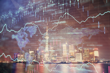 Fototapeta na wymiar Financial graph on night city scape with tall buildings background multi exposure. Analysis concept.