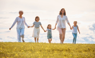 Happy family on summer walk