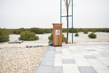 Wooden Dustbin box in Abu Dhabi Mangrove Park.Modern eco trash bin.Dump your waste in proper place.Day time photography with Nikon.March 14th 2020.