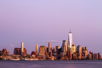 Beautiful view of New York city skyline with waterfront at evening, USA