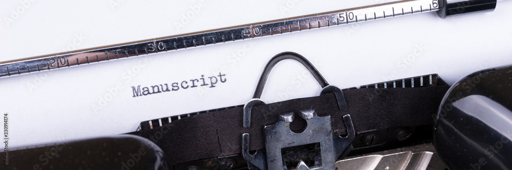 Fototapete the word manuscript typed on retro black typewriter. panoramic image