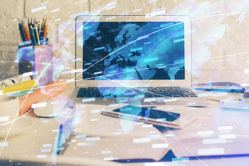 Multi exposure of desktop computer and technology theme hologram. Concept of software development.