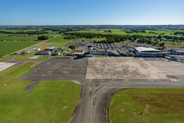 Aéroport de Pau-Pyrénées terminal and tower viewed from above the runway