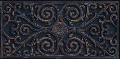 dark tile with arabic ornamental pattern