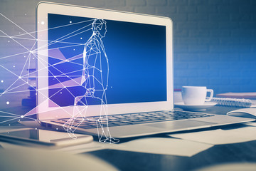 Desktop computer background in office and start up theme hologram drawing. Double exposure. Startup...