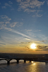Fototapeta na wymiar panorama of the city of Nizhny Novgorod. sunset over the bridge and the Oka river