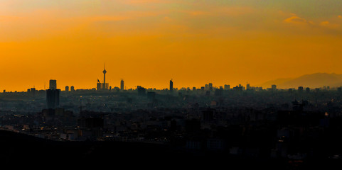 Fototapeta na wymiar beautiful sunset over Tehran-Iran skyline at an amazing afternoon with unique clouds in the sky.