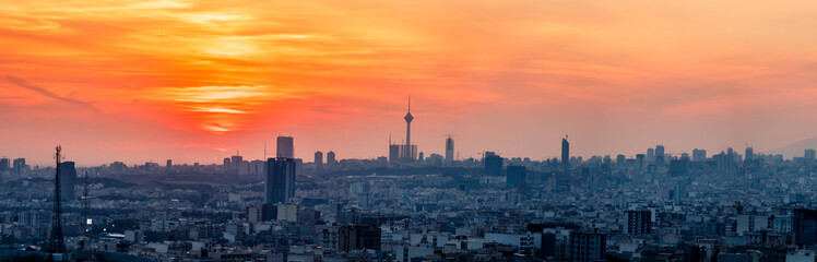 beautiful sunset over Tehran-Iran skyline at an amazing afternoon with unique clouds in the sky.