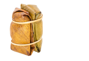 Khao Tom Mat (Coconut Rice with Banana Filling) Thai Dessert isolated on white background, Clipping path.