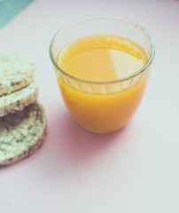 glass of juice and cookies