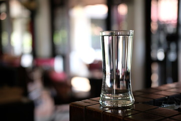 Glass of water on table
