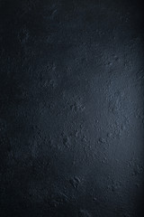Abstract grunge dark navy blue background, textured. Copyspace.