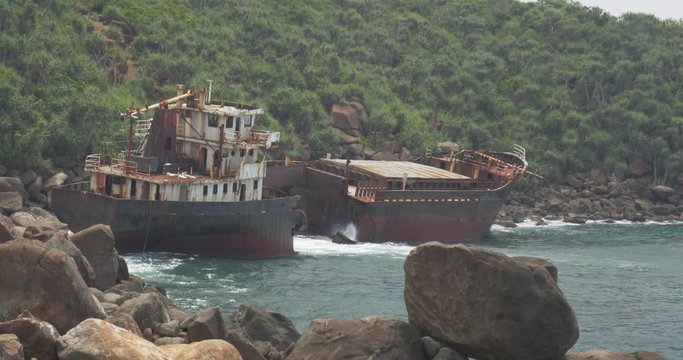 The rusty shipwreck run aground. Sri Lanka