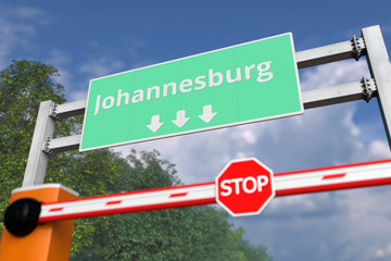 Fototapeta premium Closed barrier with STOP sign at Johannesburg, South africa road sign. Coronavirus or some other disease quarantine related 3D rendering