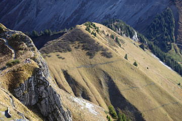 Swiss hills in summer with hikers 