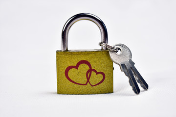 small lock with hearts and keys on a white background