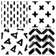 Set of 4 black and white seamless patterns with geometric shapes: triangles, crosses, stripes hand drawn with ink. Vector wallpapers. Simple grunge style backgrounds.	
