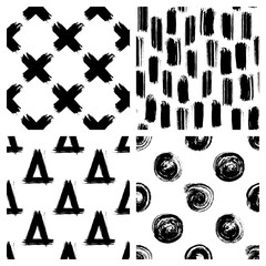 Set of 4 black and white seamless patterns with geometric shapes: circles, triangles, crosses, stripes hand drawn with ink. Vector wallpapers. Simple grunge style backgrounds.	