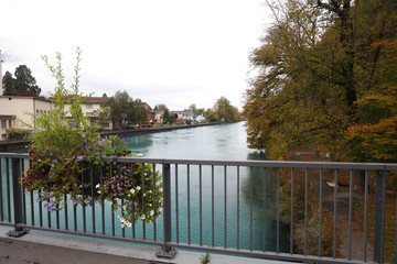 East side view of the river Aar at Interlaken with flowers 