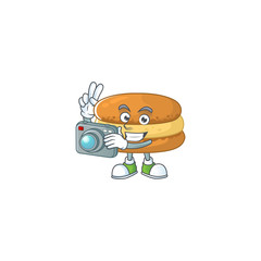 Chocolate macarons mascot design as a professional photographer with a camera