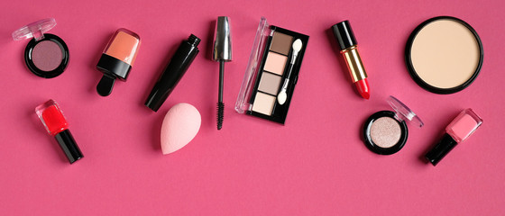 Decorative cosmetics and accessories for makeup on pink background. Beauty blog banner design.