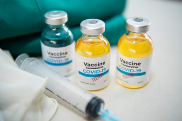 Vaccine and syringe injection. It use for prevention,immunization and treatment from corona virus infection(novel coronavirus disease 2019,COVID-19,nCoV 2019 from Wuhan). Medicine infectious concept.