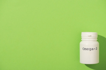 Top view of container with omega-3 lettering on green background