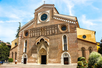 Fototapeta na wymiar Udine, Italy. Beautiful architecture of catholic church (Cathedral of Santa Maria Annunziata) in Udine.