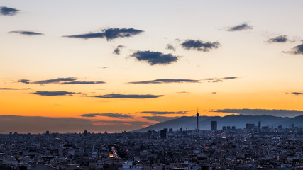 Tehran skyline at the sunset with Milad tower in the frame, colorful photo of Tehran-Iran cityscape