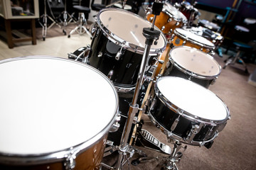 Fototapeta na wymiar Professional drum kit in instrument shop, instrumental concept
