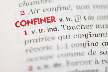 Fototapeta premium Définition du mot confiner dans le dictionnaire