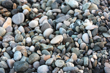 Abstract smooth round pebbles sea texture background.