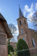 Fototapeta na wymiar Horebeke East Flanders Geuzenhoek. Farmhouse and church.
