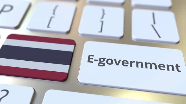 E-government or Electronic Government text and flag of Thailand on the keyboard. Modern public services related conceptual 3D animation