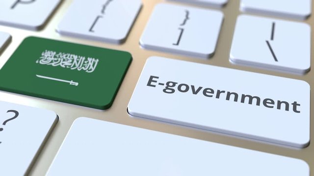 E-government or Electronic Government text and flag of Saudi Arabia on the keyboard. Modern public services related conceptual 3D animation