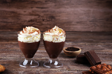 hot chocolate with cocoa and chocolate chip cookies and whipped cream