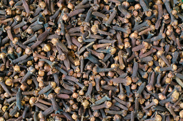 Cloves background. Top view. Cloves spice pattern