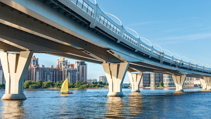 bottom view of the high-speed bridge over the Gulf of Finland on the blue sky background