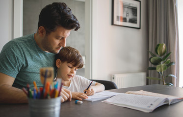 Father and Son doing homework Together