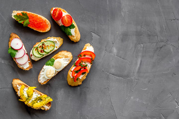 Sandwiches frame for menu design on grey background top-down copy space