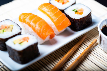 ..shusi on plate with traditional accessories