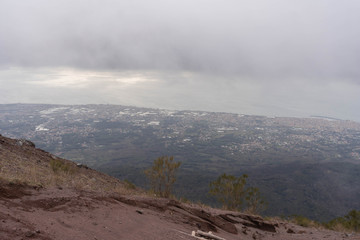 Vesuvius Crater in the clouds in cloudy weather, Italy