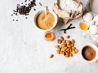 Cooking flat lay of various food ingredients for baking on a white background. Copy space. Top view. Baking concept. Mockup.
