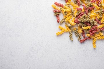 Multicolored macaroni background concept. Diet and healthy food concept. Italian cuisine concept...